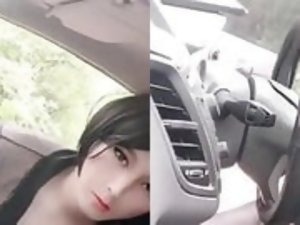 Chinese Tranny Jerk Herself Off in Car with Huge Dildo